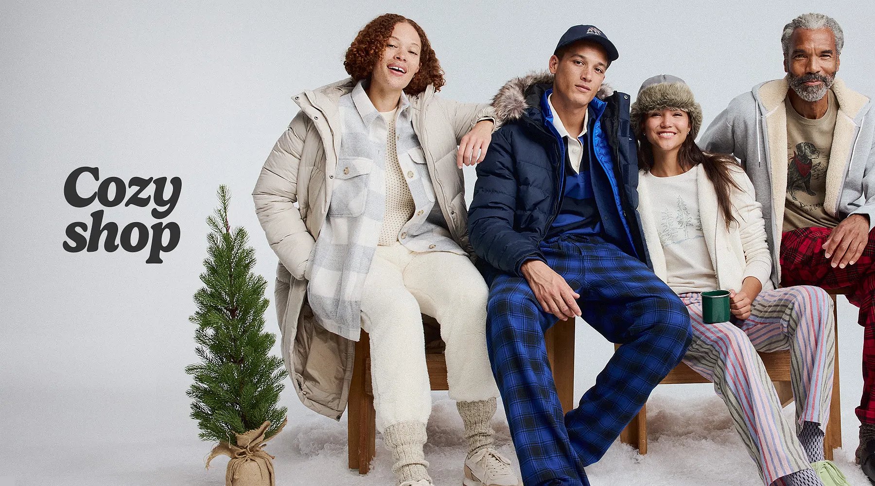 Cozy shop. A group of people wearing comfy sweats, pajamas, and down outerwear.