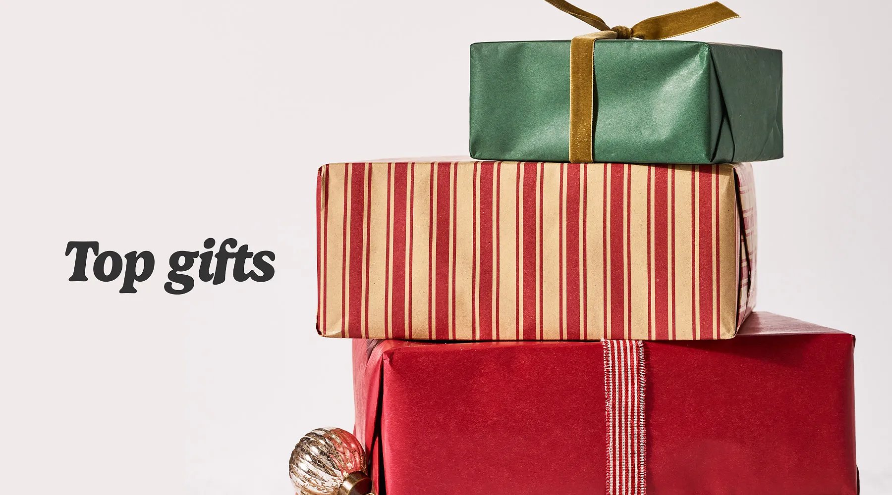 Top gifts. A stack of wrapped holiday gifts.
